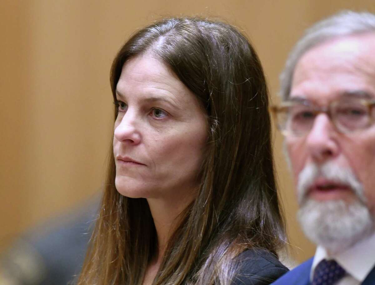 Michelle Troconis, 44, appears in court in August with her attorney Andrew Bowman in relation to her charges of tampering with evidence and first-degree hindering prosecution in the disappearance of Jennifer Dulos.