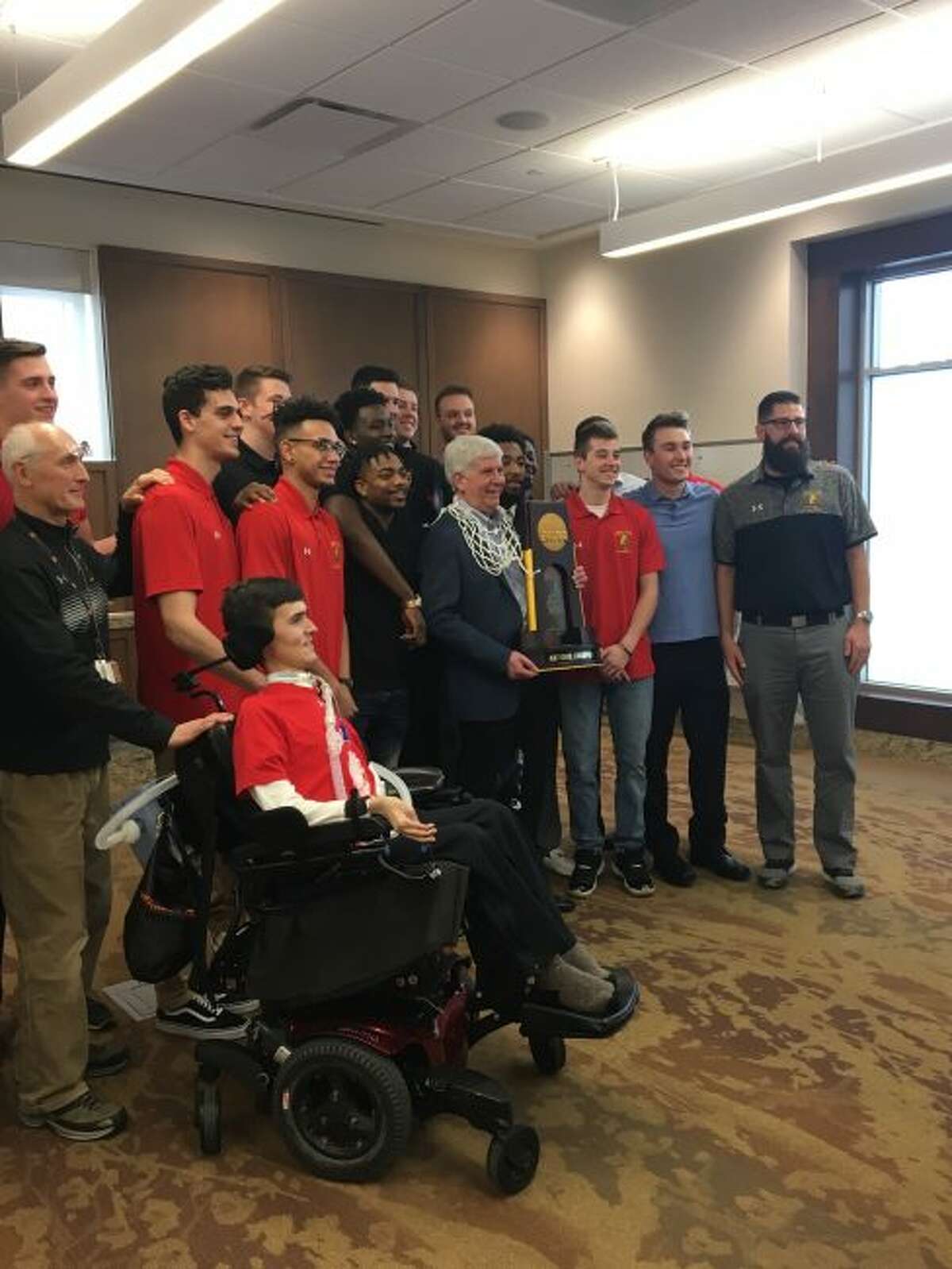 While at Ferris State University, Gov. Rick Snyder also presented a tribute to the Bulldogs basketball team, congratulating them on winning the NCAA Division II national championship. (Courtesy photo)