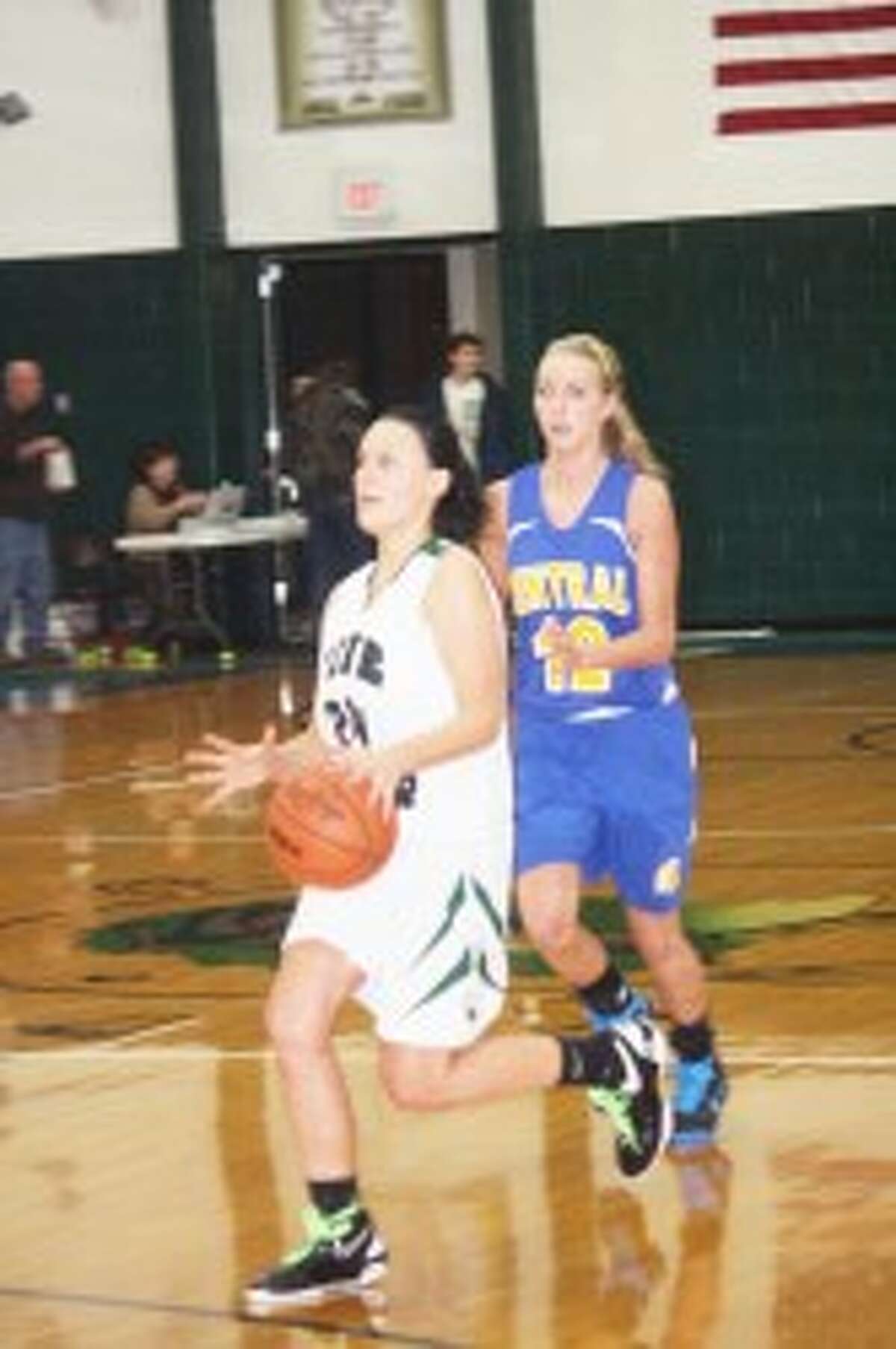 WINNING STREAK: Haley Raymond of Pine River takes the ball down the court. (Herald Review photos/John Raffel)