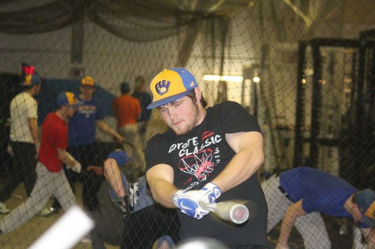 Josh Dorn works on his swing.