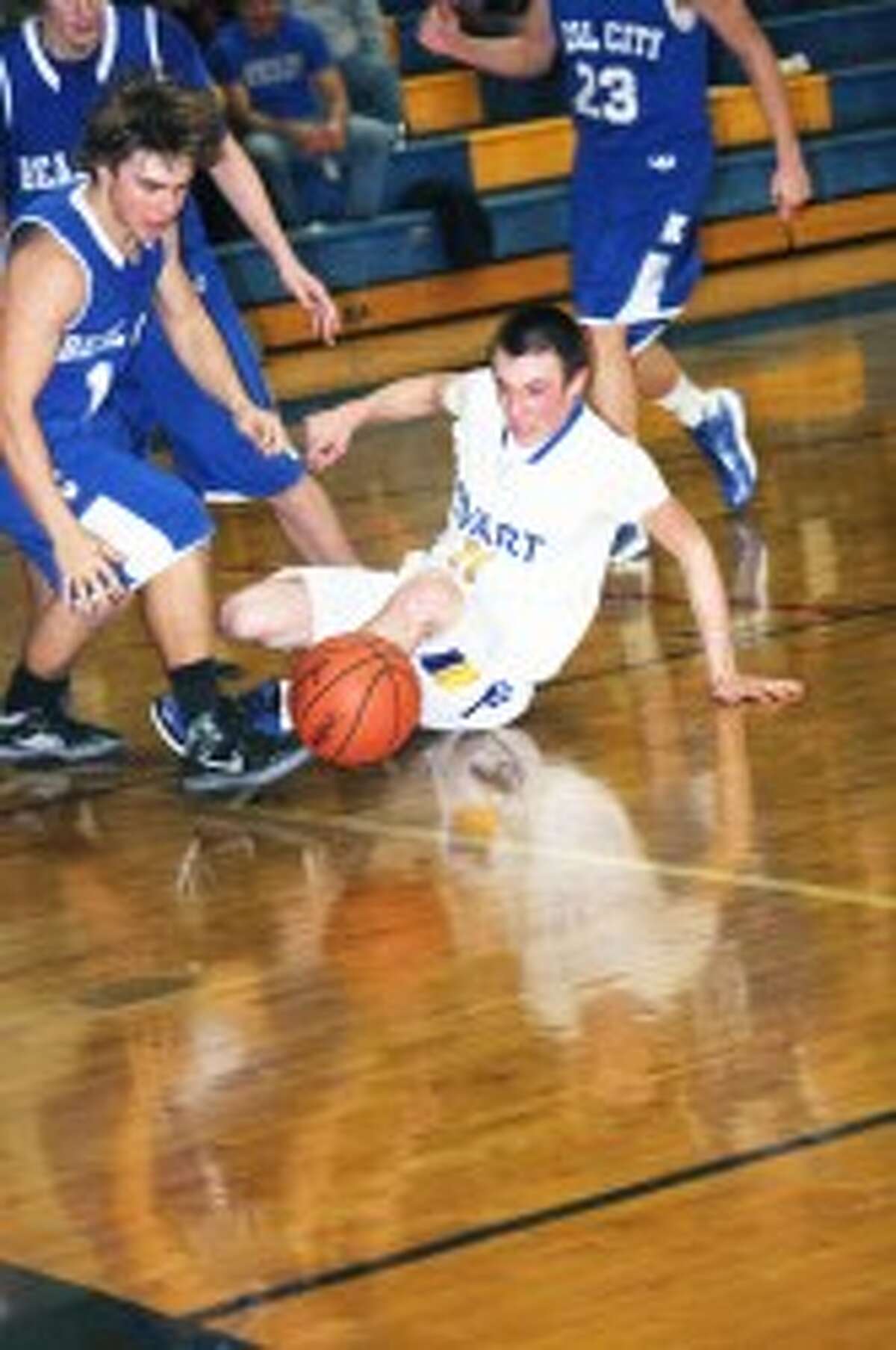 IMPRESSIVE WIN: Jared Pattee of Evart goes after the ball against Beal City. (Herald Review photo/John Raffel)