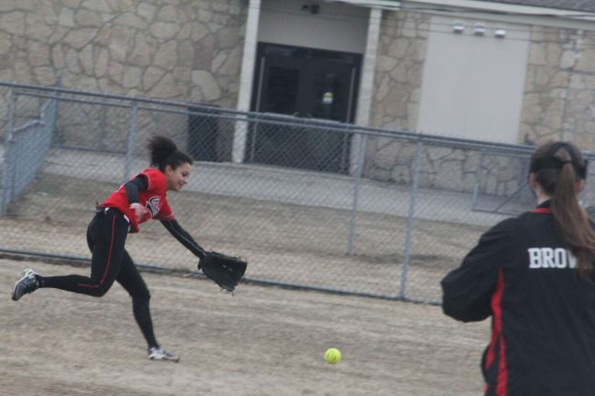 Kiera Barker chases down the ball against Kalkaska.