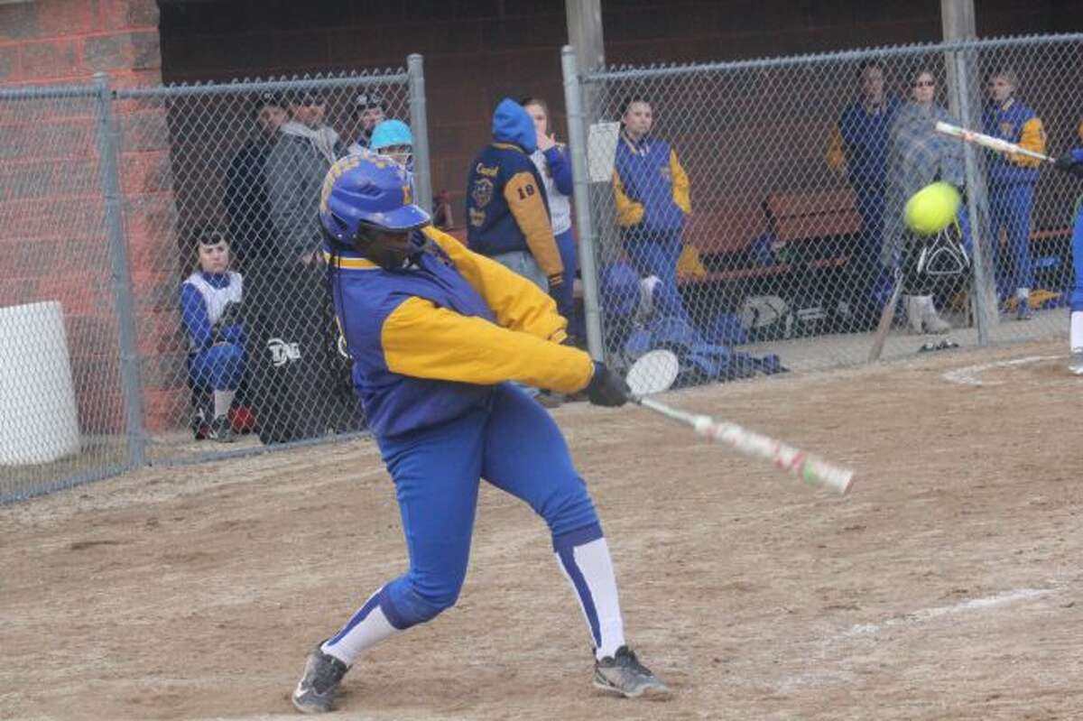 Cyana Dellar connects with a pitch.
