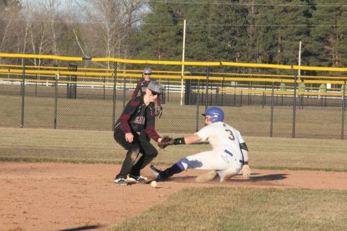 Billy Conklin slides safely into second base during the season.