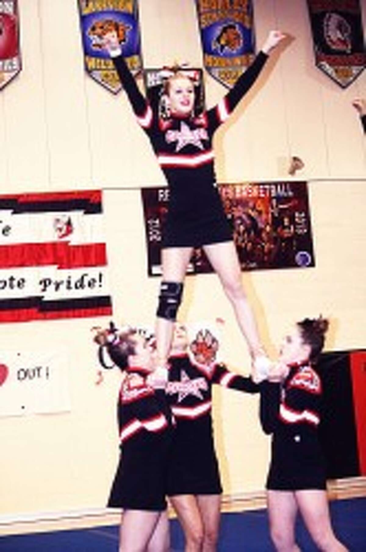 CHEER: Evart and Reed City cheer teams will be in the districts this weekend along with Pine River. (File photos)