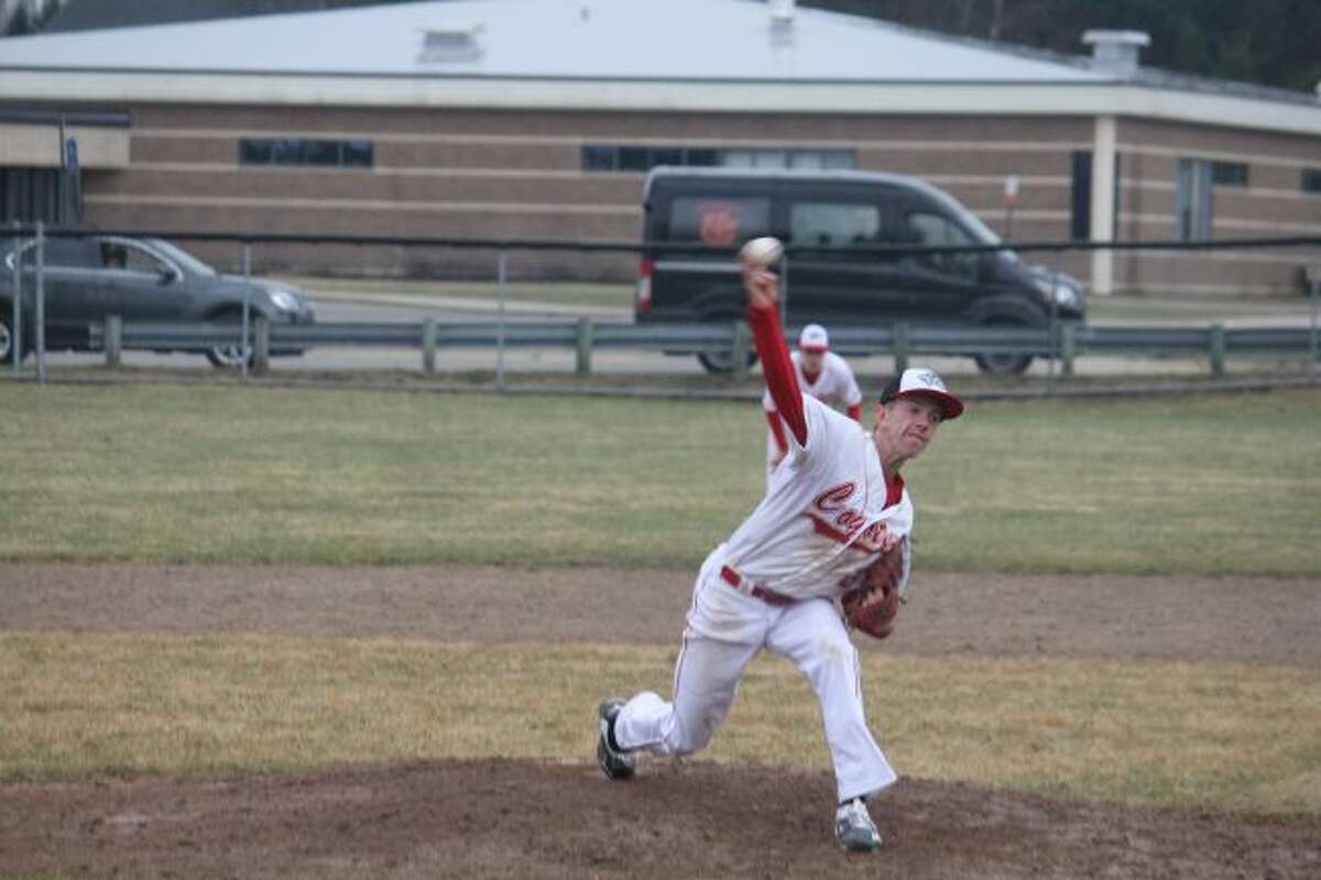 Reed City's Hunter Morrison fires a pitch to the plate.