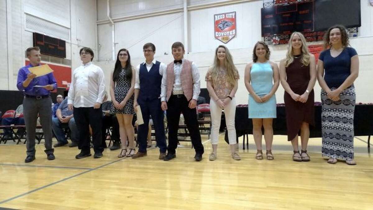 Reed City High School seniors stand ready to receive their award certificates during the 2018 Senior Honors Program on Wednesday, May 9. (Herald Review photo/Meghan Gunther-Haas)