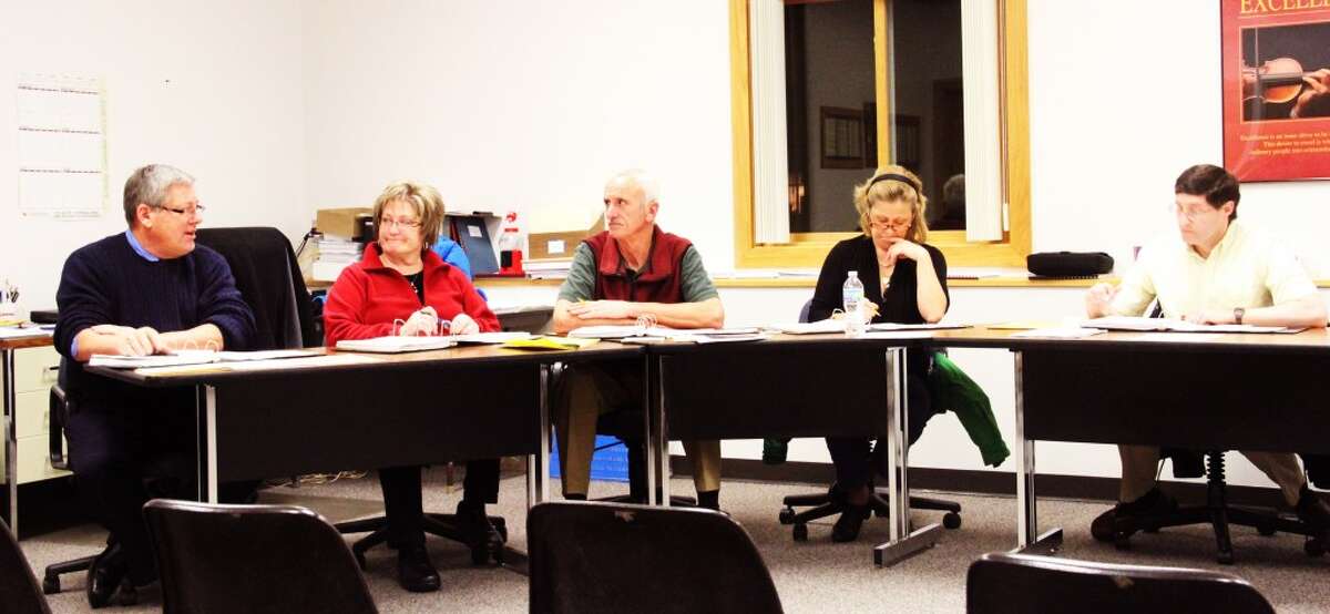 SCHOOL BOARD: Evart school board members consider the future of a building that is no longer in use. (Sarah Neubecker/Herald Review photo)