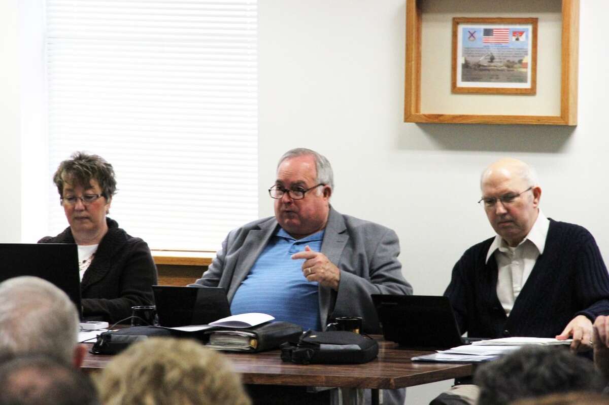 COMMISSION MEETING: Osceola County Board of Commissioners Chairman Larry Emig address the group during its Feb. 5 meeting. The board approved funding up to $2,500 for electrical installation for two-way interactive video systems in each of the county’s three courtrooms. (Herald Review photo/Sarah Neubecker)