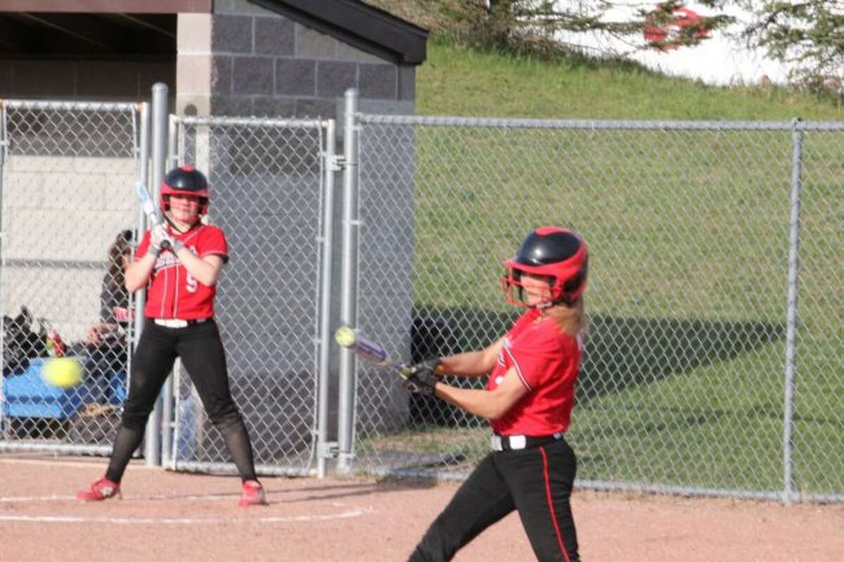 Kamryn Myers connects on a pitch for Reed City.