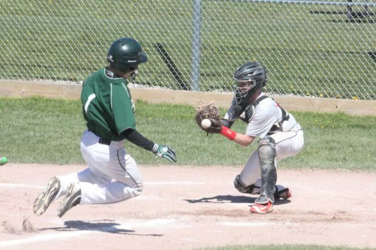 Pine RIver's Jacob Roberts gets set to slide safely into home plate