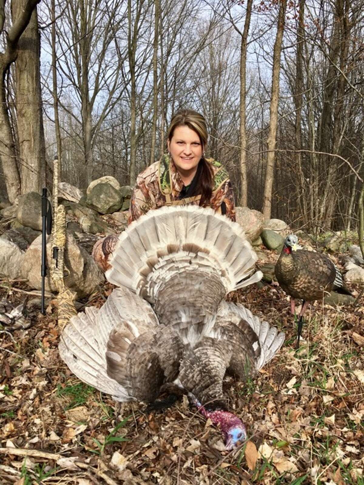 Tammy Livermore of Hersey shows off her unusual smoky-gray colored turkey.