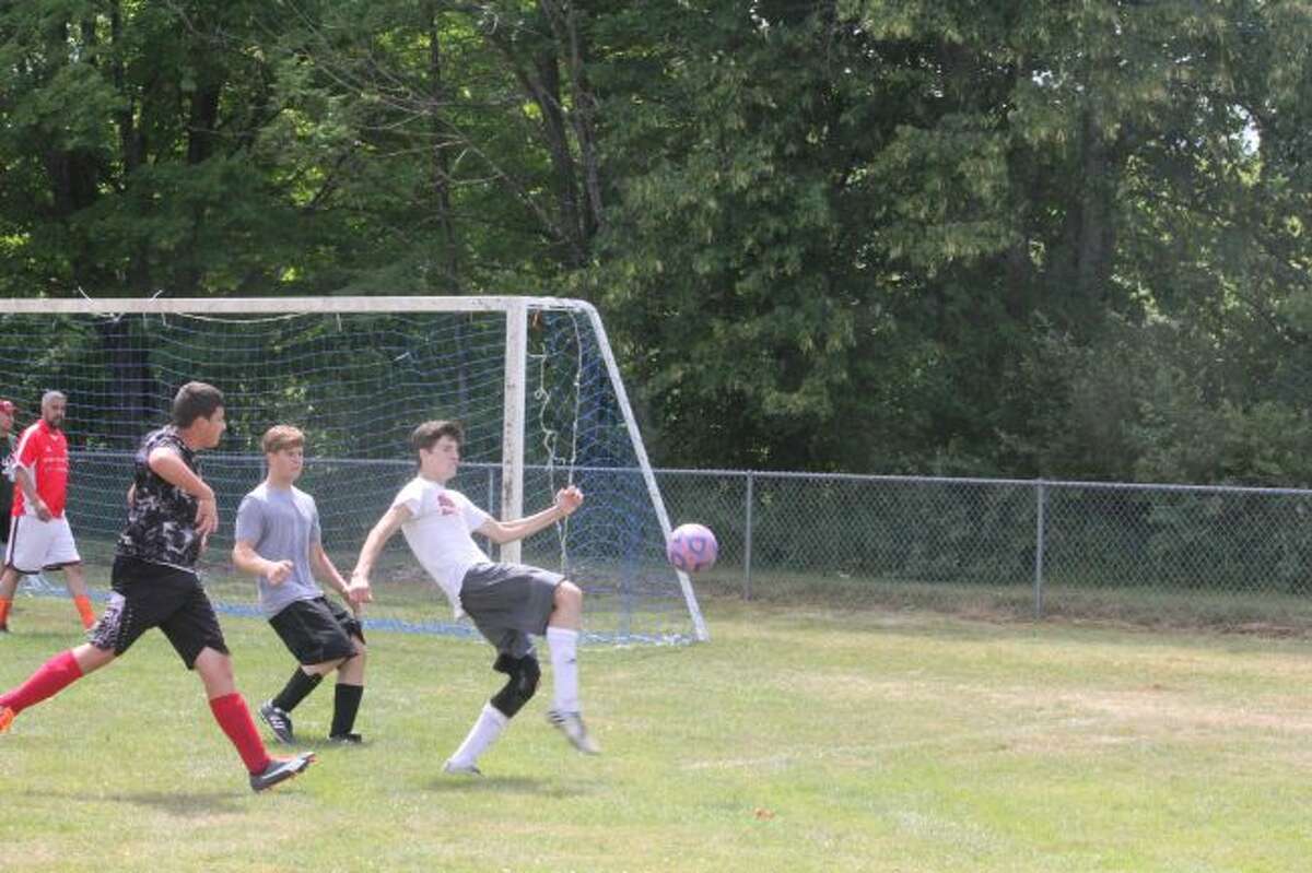 Pine River soccer players work out at camp.