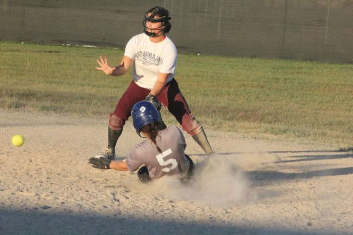Maddie Morgan slides into second base.