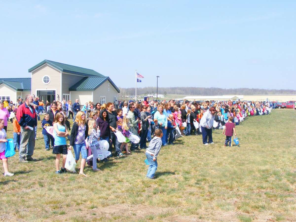 EGG DROP: Hundreds of kids had a ton of fun last year at the first egg drop alongside runways at the Evart Airport. There’s more fun to come this weekend. (File photo)