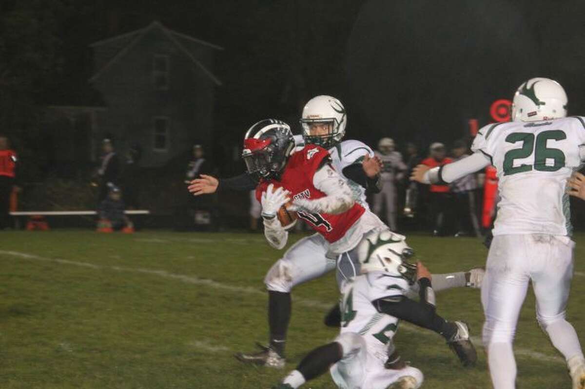 Phillip Price-Jones fights for yardage.