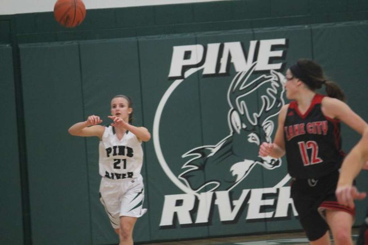 Pine River's Logan Powell throws a pass down the court.