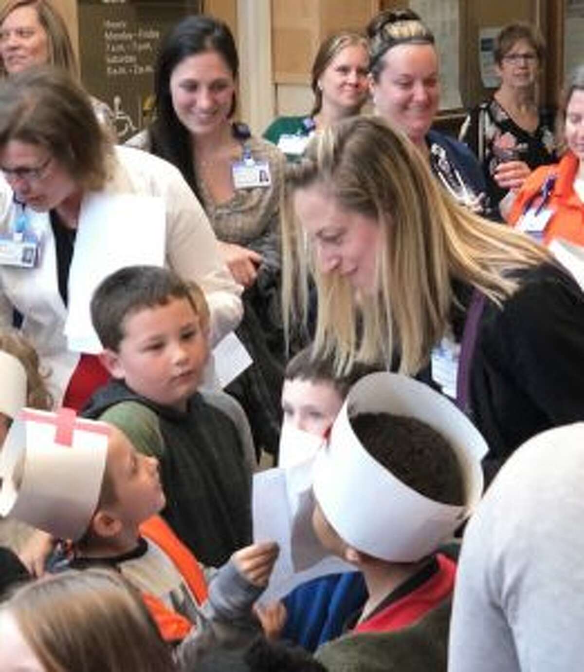 Mary Underhill greets students from Riverview Elementary when they walked to the hospital to celebrate Nurses Week. (Courtesy photo)