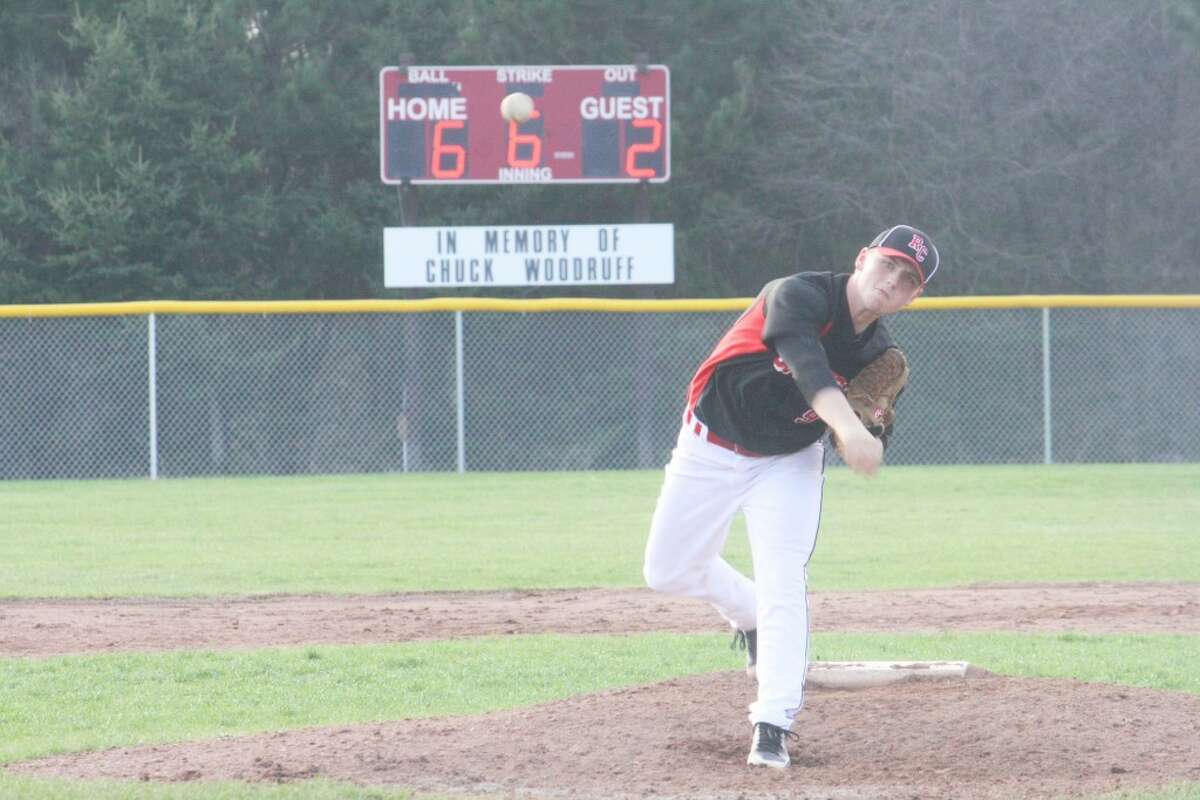 PITCH: Sean Woodside fires a pitch to the plate for Reed City against Chippewa Hills last week. (Herald Review Photo/John Raffel)