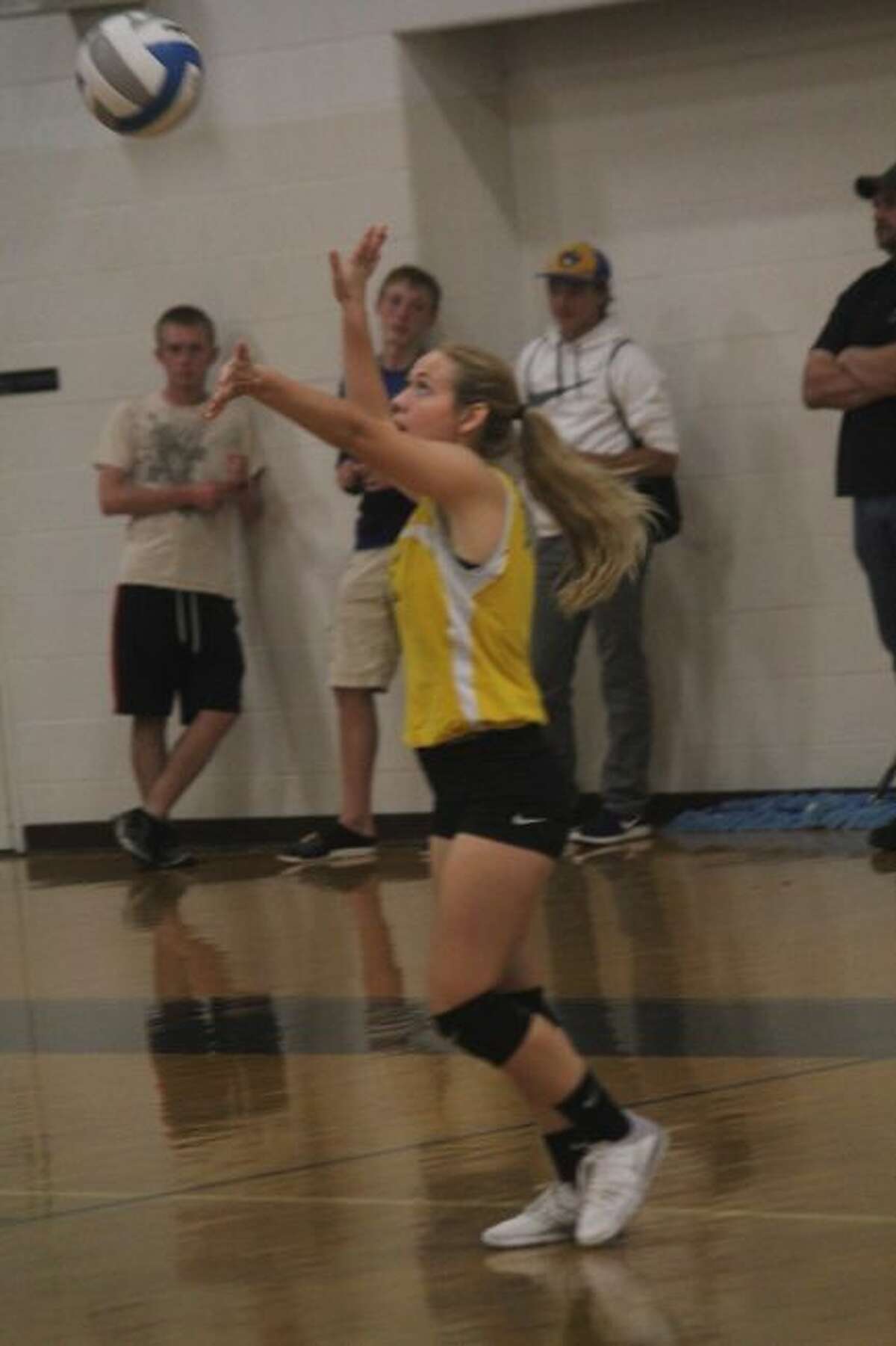 Kaylee Ladd plays the ball for Evart.