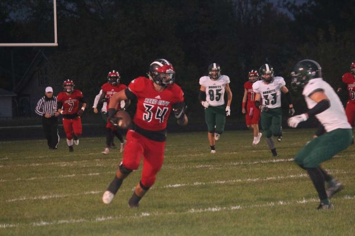 Anthony Pelton finds running room for Reed City.