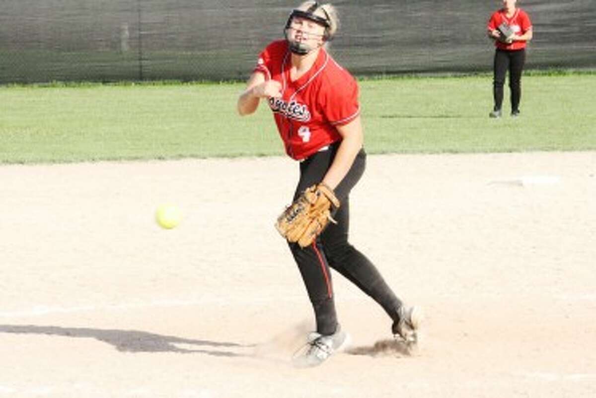 THROWING STRIKES: Reed City's Jules Griffin fires in a pitch toward home plate during Thursday's doubleheader against Big Rapids. (Pioneer photo/John Raffel)