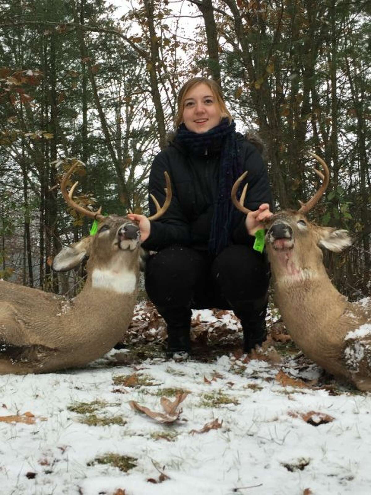Emily Fabus shows her two bucks/