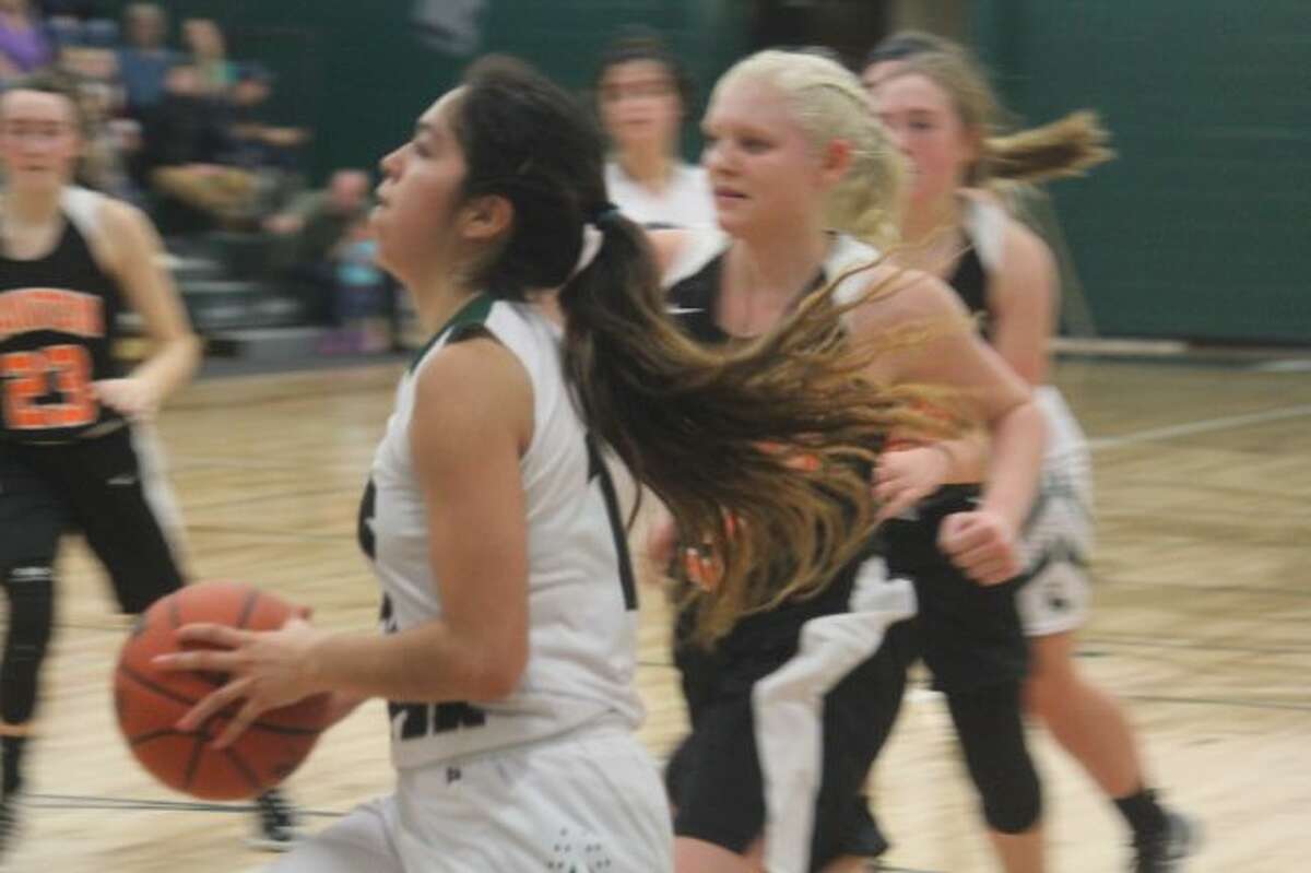 Anselma Barnett glides to the basket for Pine River.