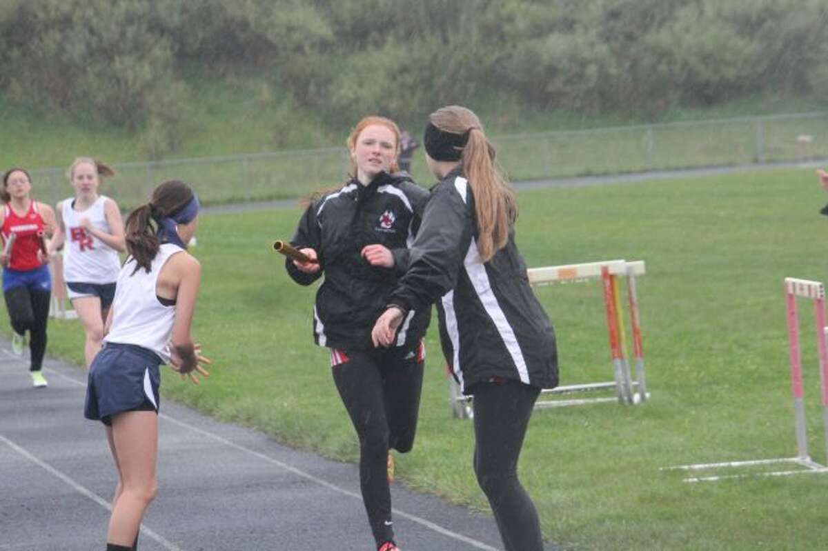 Meghan Borst gets set to make the handoff.