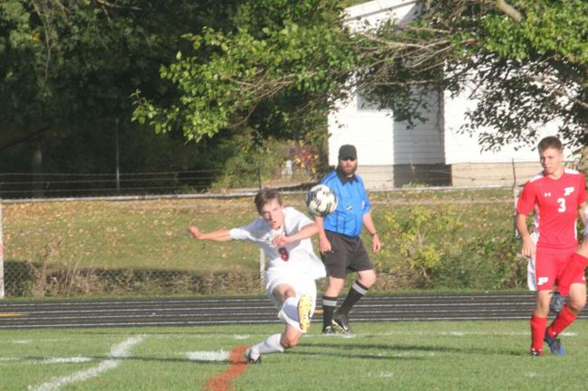 Reed City's soccer team is on the attack against Fremont.