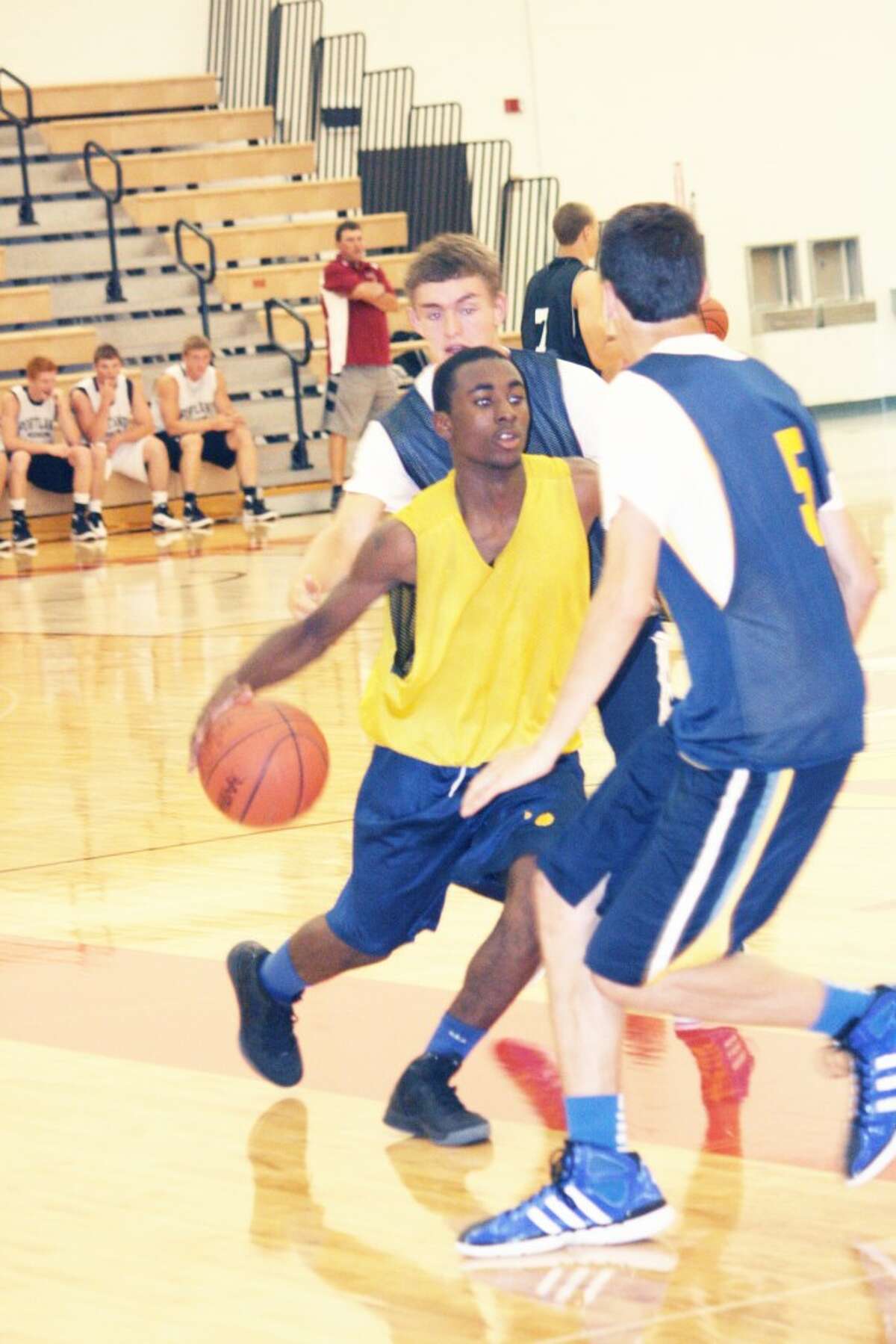 Keeping busy: Basketball teams will be busy during summer camps this month. (File photo)