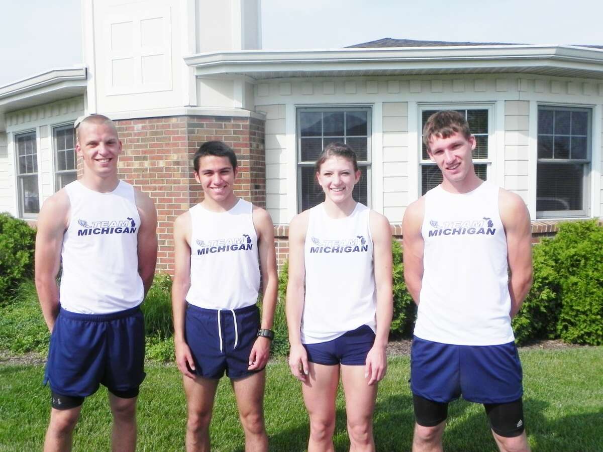 Part of the team: Mitchell attended the meet along with three other local athletes: from left, Trent Karcher of Chippewa Hills in the 200 and 800 relay, Clark Ruiz of Big Rapids in the 200 and 800 meter relay and Travis McCuaig of Morley Stanwood in the high jump. (Courtesy photo)
