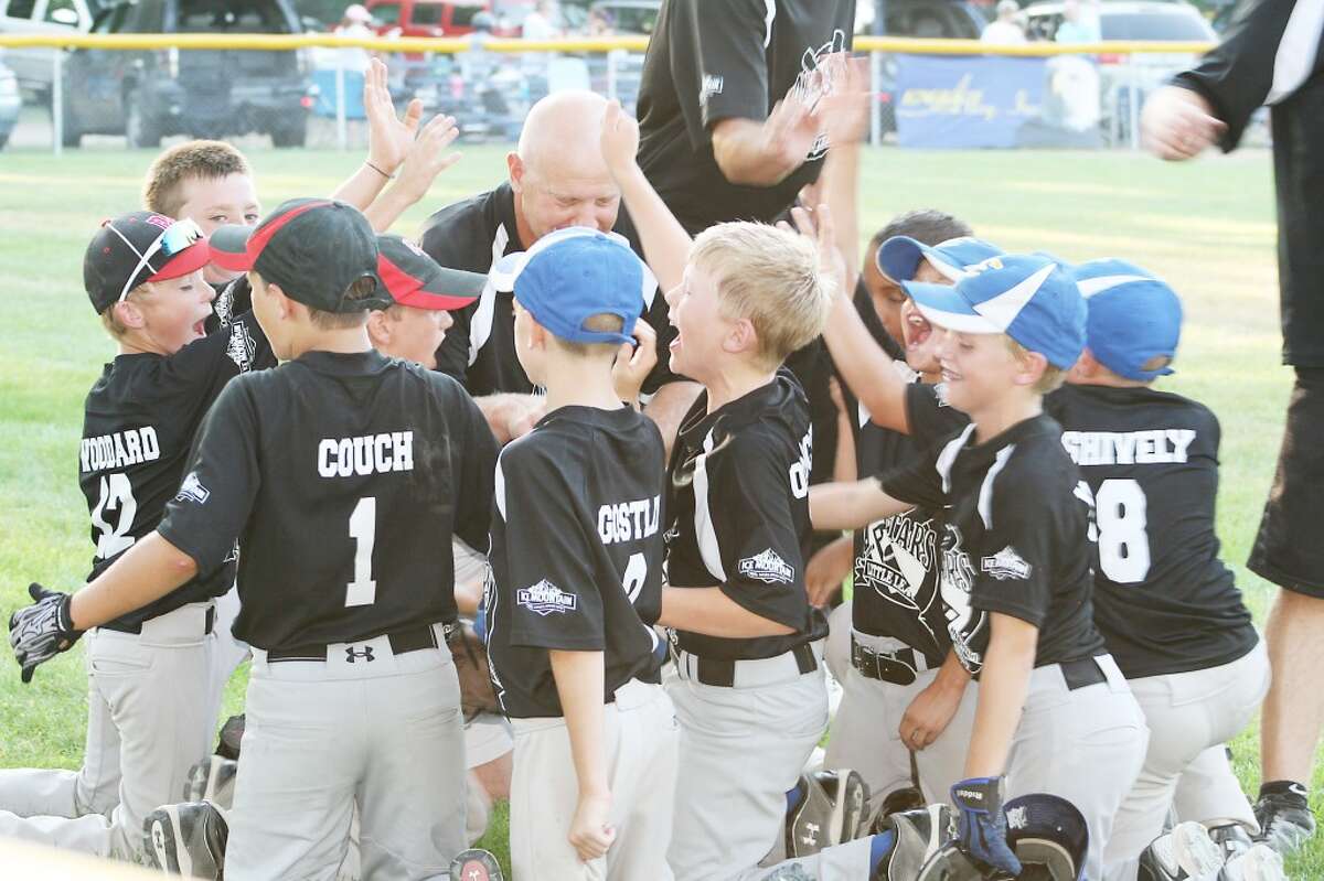 Little League: Reed City-Evart Minor Division players celebrate their win over Oakridge last week. (Courtesy photo)