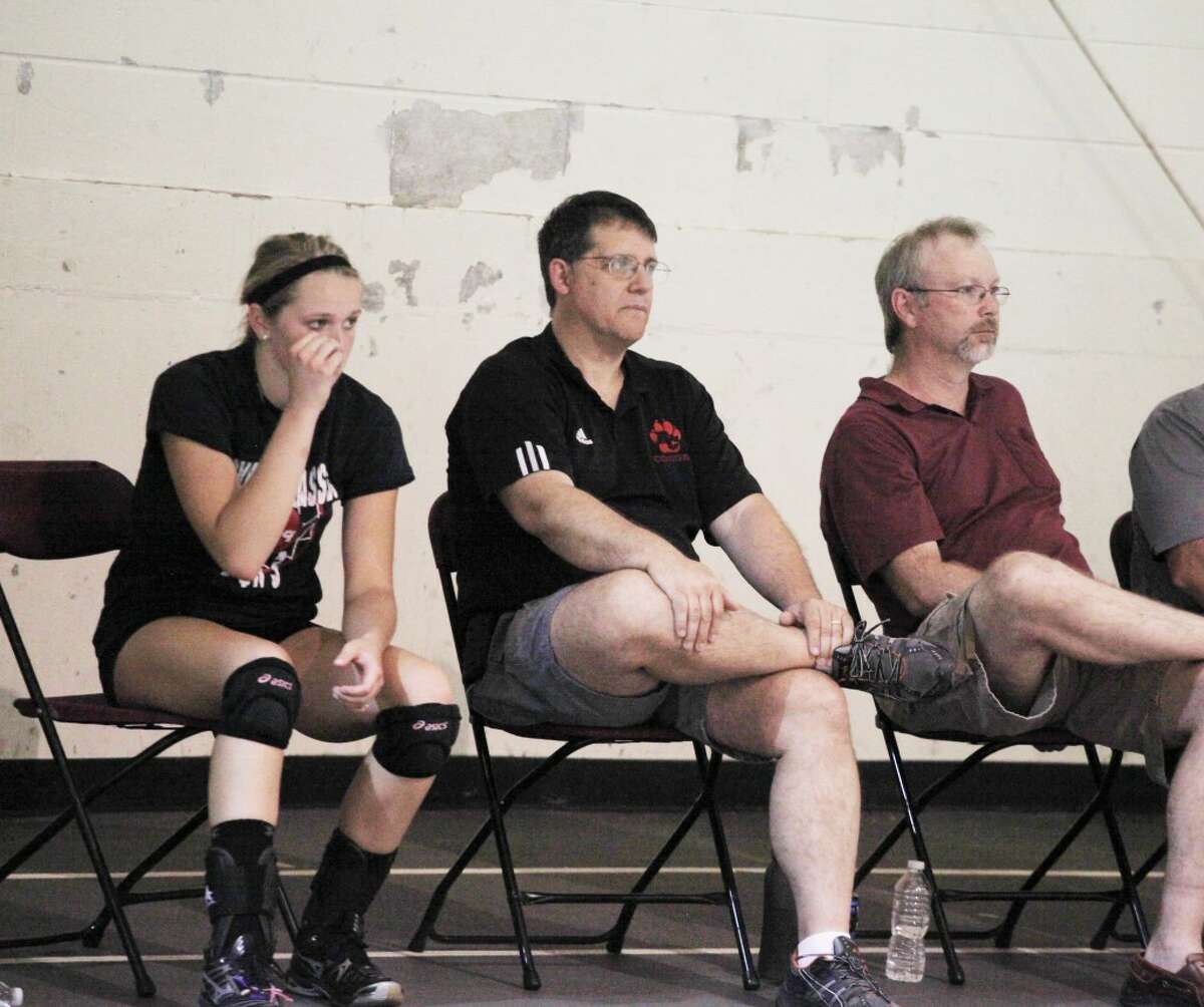 volleyball: Reed City volleyball coach Don Patterson (center) watches the action during last week's Ferris State camp. (Herald Review/Martin Slagter).