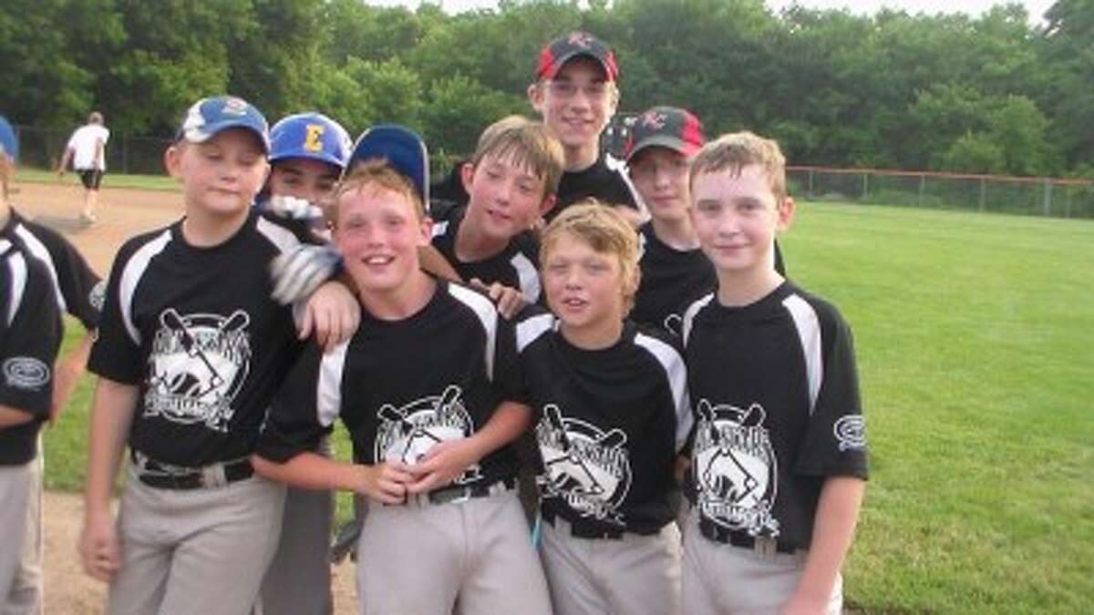 Birthday: Reed City-Evart Major Division All-Stars celebrate a tournament win. (File photo)