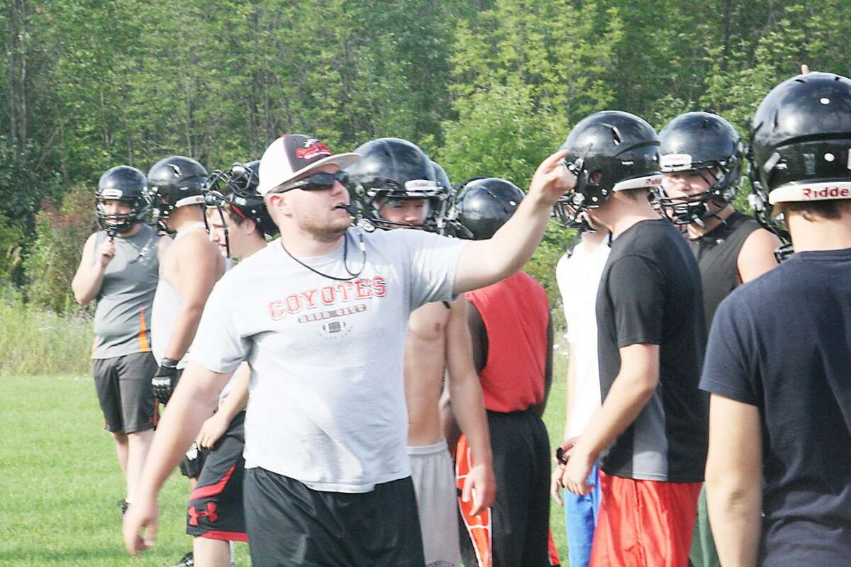 Skills camp: Reed City football coaches and players get ready for a skills camp last week. (Herald Review/John Raffel)