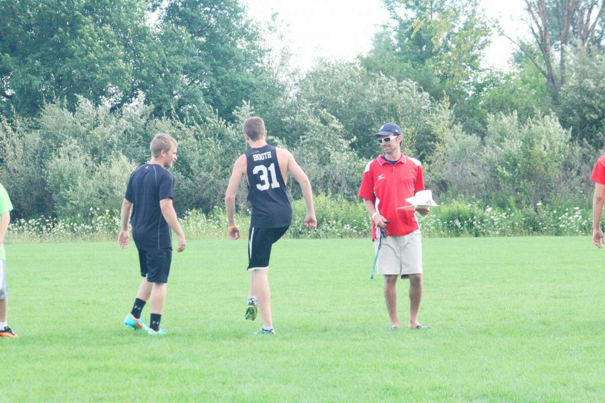 Soccer Practice: Reed City soccer players work on conditioning drills Monday night. (Herald Review/John Raffel)