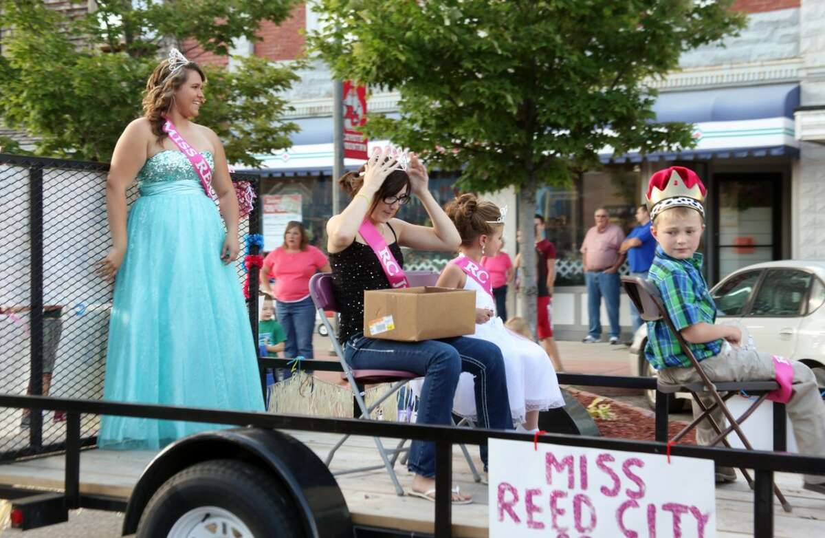 REED CITY ROYALTY: Miss Reed City Taylor Holmes and other youth who were crowned in Thursday’s pageant ride in the parade on Friday.