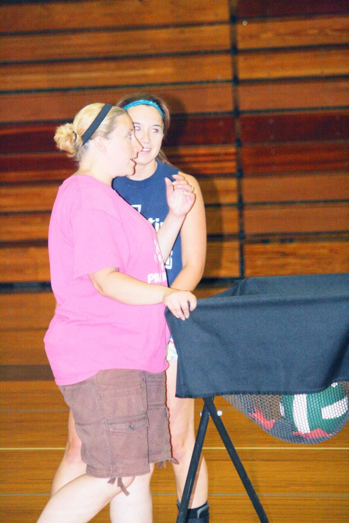 Pine River volleyball coach Jana Dennis, left, and her team opens action Saturday at Traverse City. (File photo)