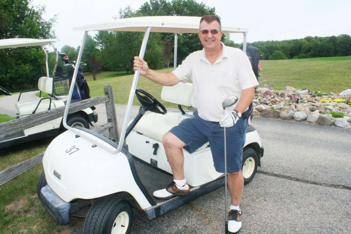 Gary Bailey gets ready for a round of golf at Spring Valley. (Herald Review/John Raffel)