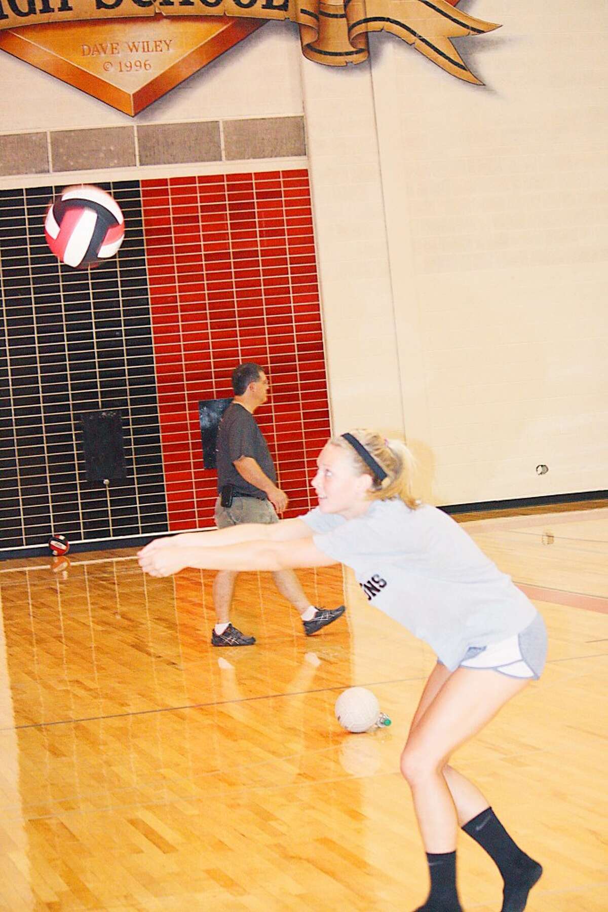 Volleyball: Natalie Westoff works on her passing at a Reed City practice. (Herald Review/John Raffel)
