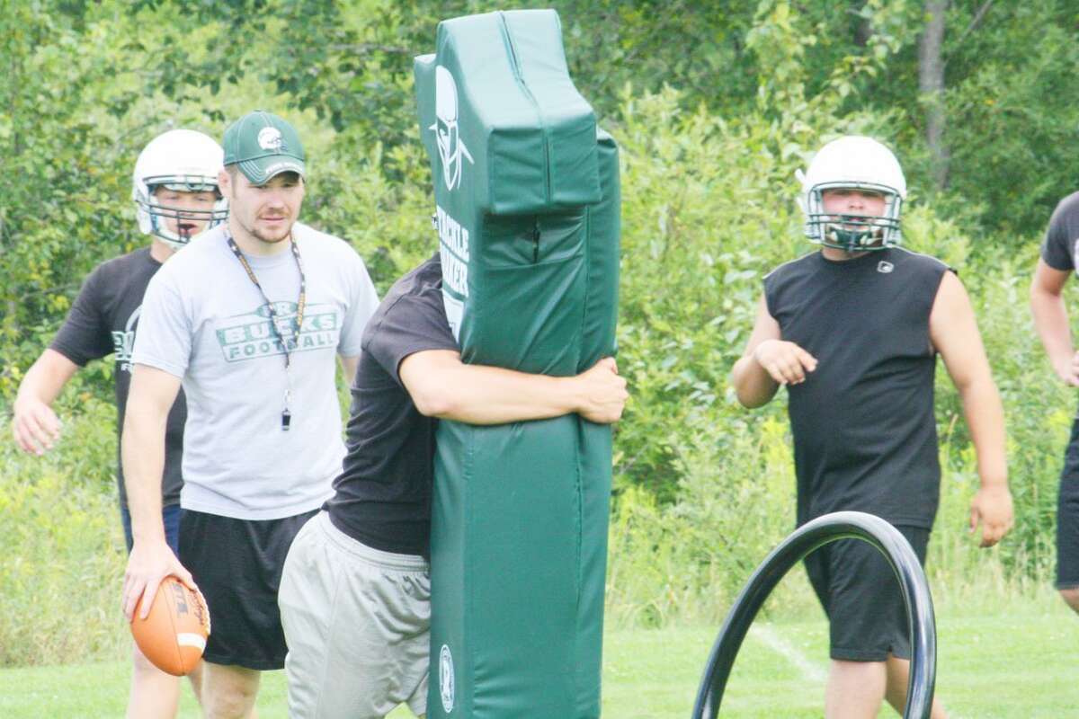 Coach: Pine River football coach Terry Martin (left) and his Pine River Bucks are preparing for Benzie Central Friday night. (File photo)