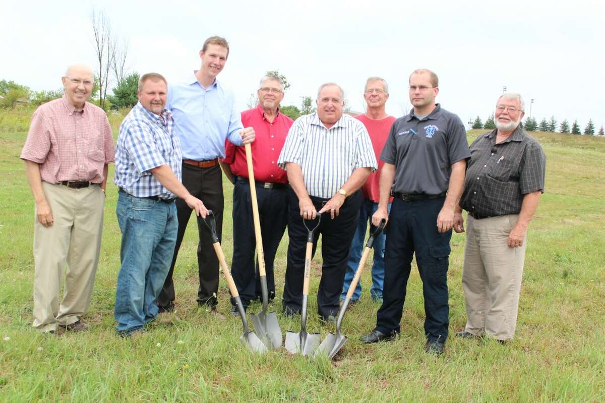 Construction: Area officials, including (from left) commissioner Roger Elkins, project manager Scott Stephens, Rob Gustafson of architecture firm Hooker DeJong, Marion Village President Don Gilmore, commissioner Larry Emig, commissioner Ron Sikkema and commissioner Alan Tiedt. (Herald photo/Karin Armbruster)