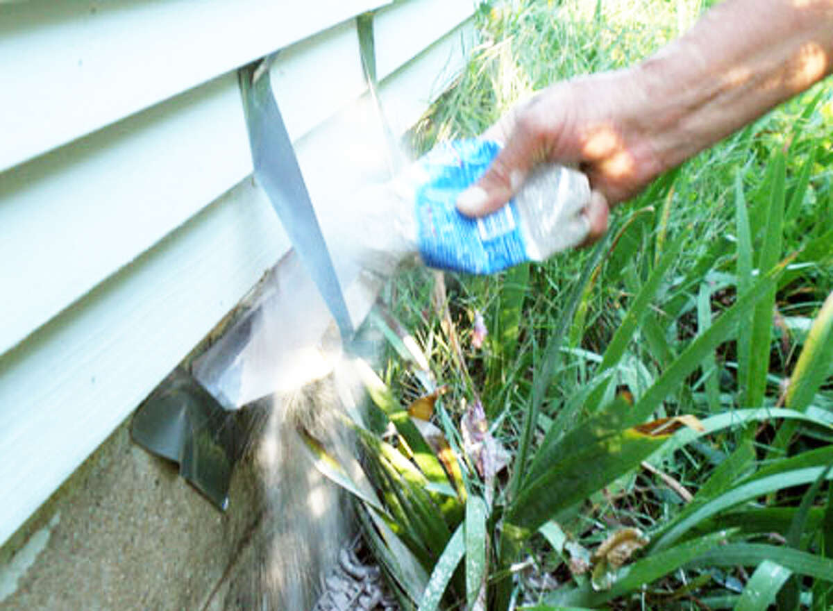 By placing the bottle opening over the nest opening and giving it a hard squeeze, my neighbor's friend violated two Michigan pesticide laws. First, he put an insecticide into a container that was not manufactured for the intended purpose of applying an insecticide, and second, he applied an insecticide to a structure that was not labeled for this use. (Courtesy image)