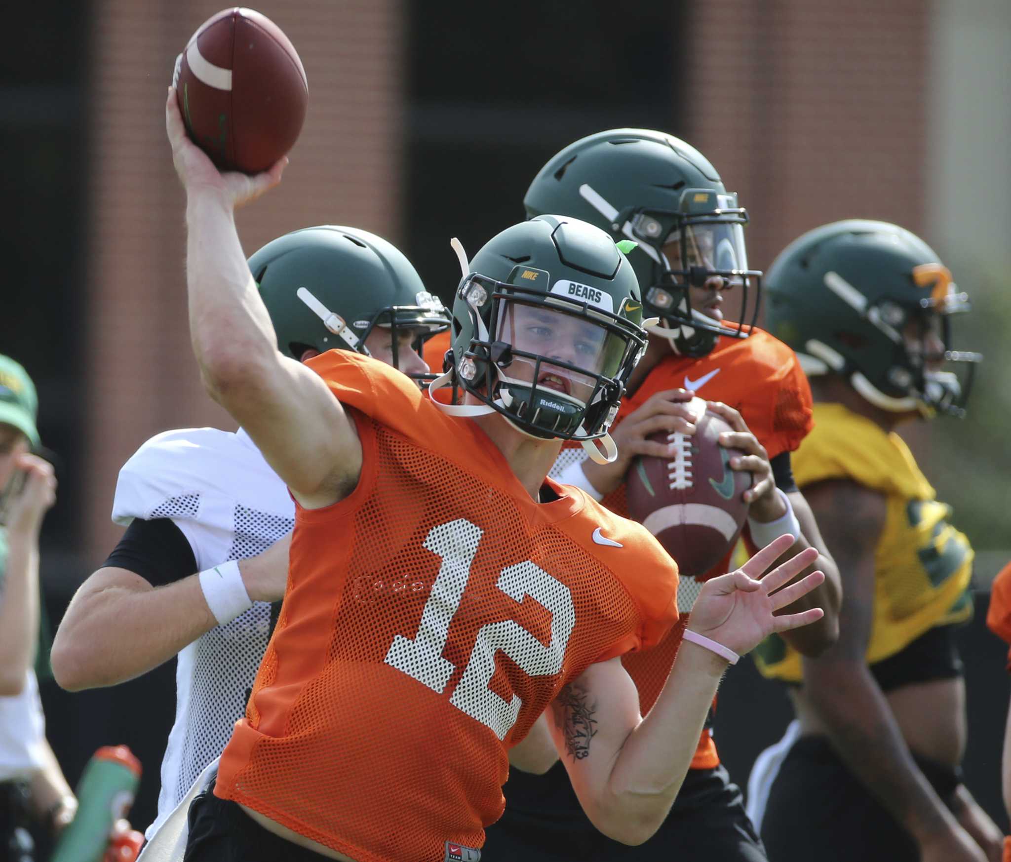 Baylor quarterback Charlie Brewer (12) is sacked by Oklahoma