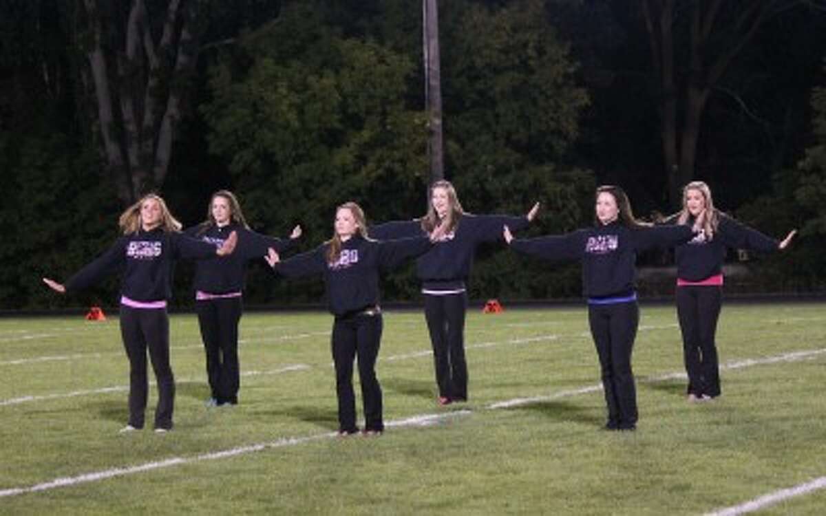 DANCE: Returning Reed City High School Dance Team members (from left) Miranda Battle, Olivia Lawson, Madilyn Allen, Alison Schermerhorn, Tristin Harltey and Natalie Baughan perform at the RCHS football game on Friday. (Herald Review photo/Shannon Hartley)