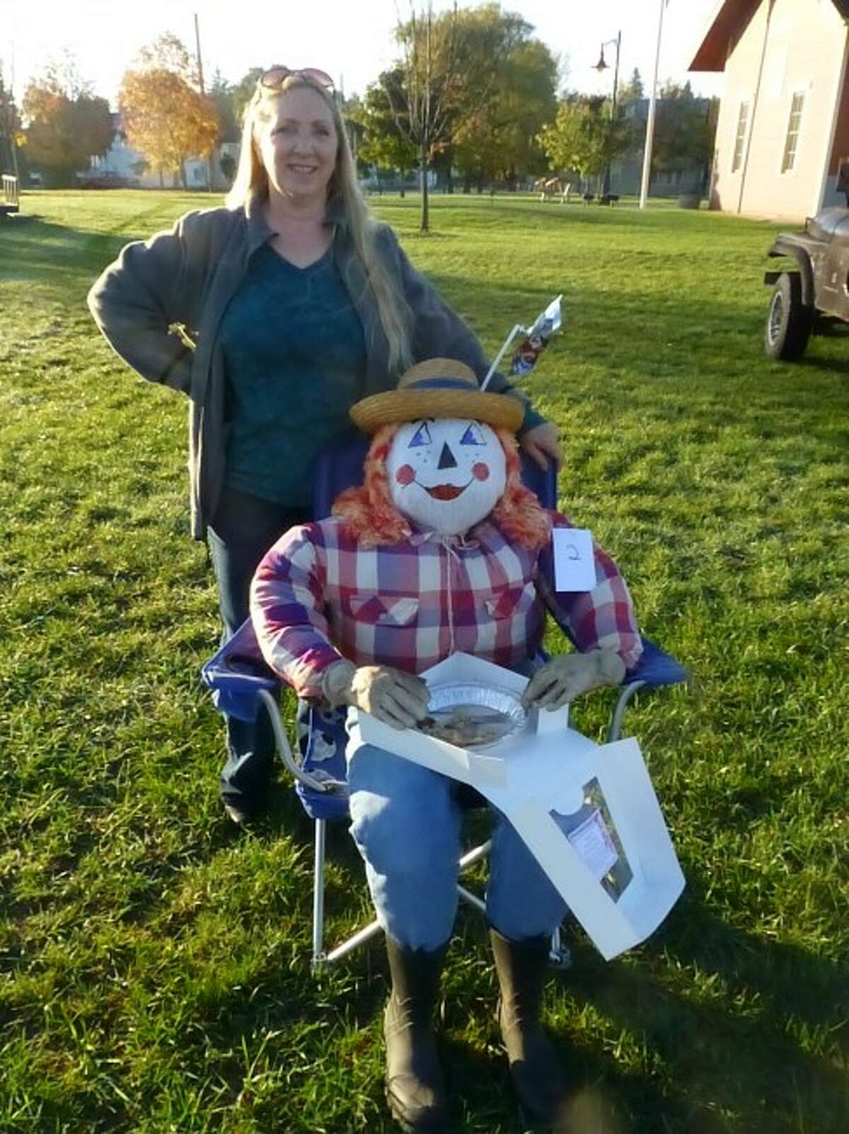Penny Nichols-Whitehead took home the winning prize for her scarecrow during the Evart Farmers Market scarecrow contest that took place on Saturday, Oct. 12. (Courtesy photo)