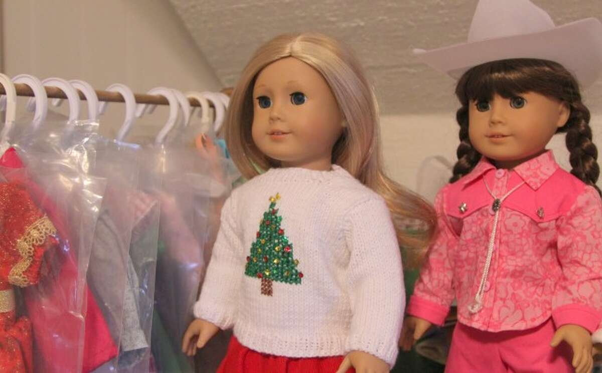 DRESSING DOLLS: Knapp has created a number of outfits for American Girl and Madame Alexander dolls. She has made cheerleading outfits, school uniforms, pajamas, dresses, sweaters and more, including her own personal touches.