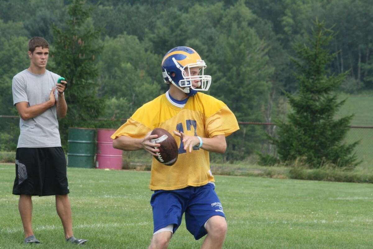 TIMING: Jacob Fortune of Evart tosses a pass during Saturday’s 7-on-7 passing tournament at Pine River.