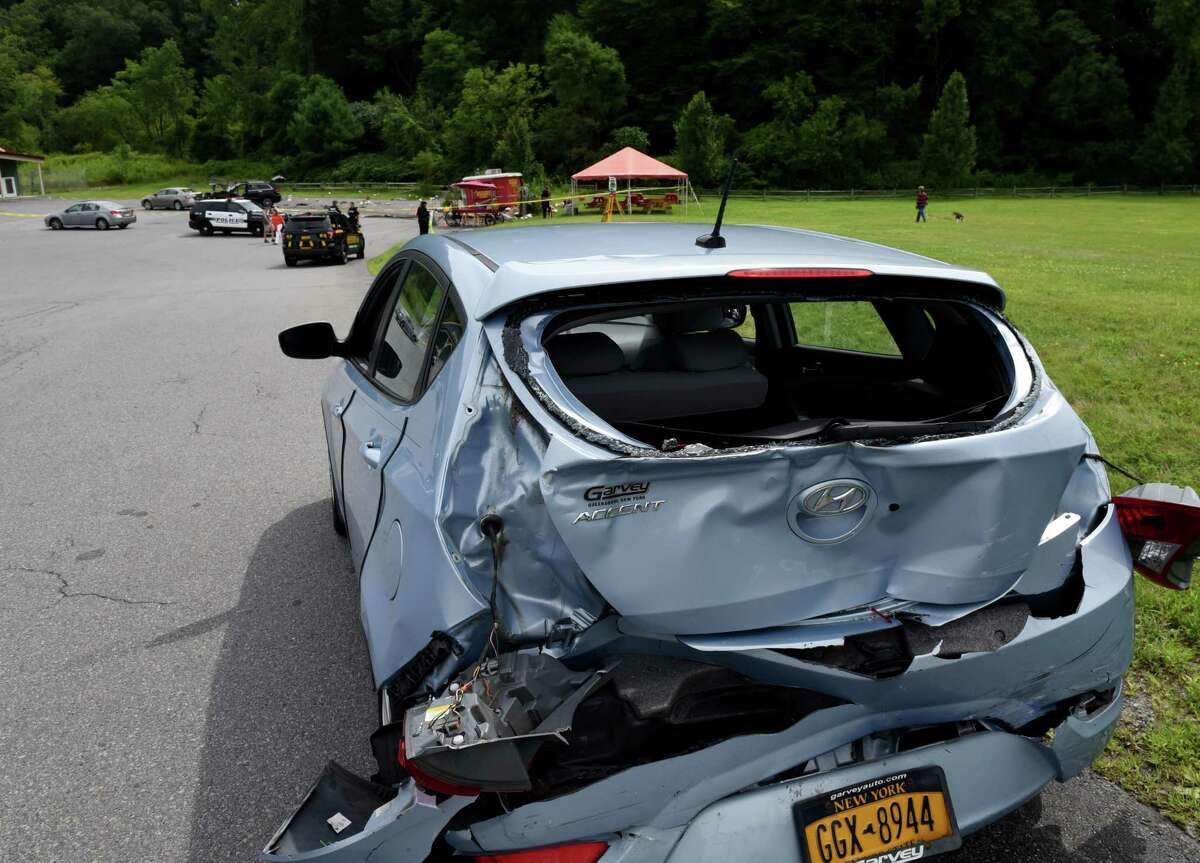 One of the cars struck after the driver of an SUV lost control of his vehicle at the intersection of Marion and Excelsior avenues, injuring five people after hitting a hot dog stand and three cars on Monday, Aug. 19, 2019, Saratoga Springs, N.Y. The driver, whom police did not immediately identify, and all five people struck were taken to Saratoga Springs Hospital for evaluation. None of their injuries were considered life-threatening. (Will Waldron/Times Union)